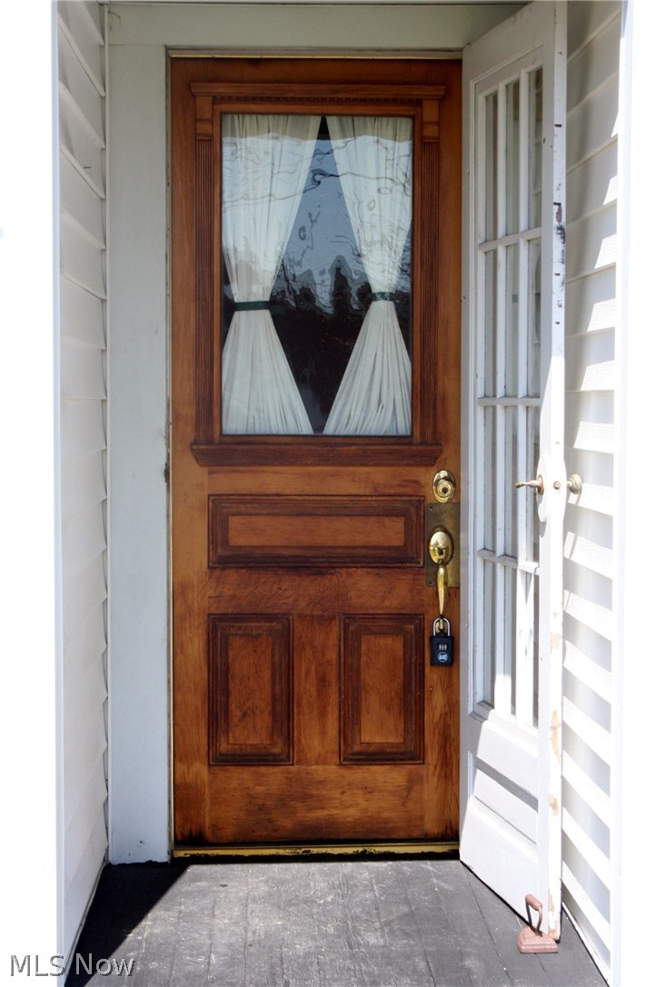 4811 Detroit Road Sheffield Lake, OH 44054 - Photo 2 of 35 Solid Wood Front Entry Door