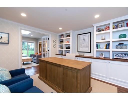 117 Forest Street Wellesley, MA 02481 - Photo 21 of 28 a living room with furniture and a book shelf