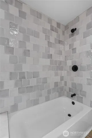 a bathroom with a bathtub