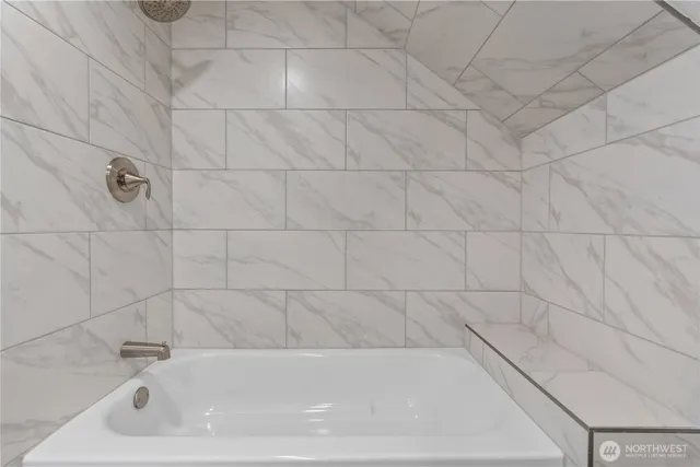 a bathroom with a bathtub