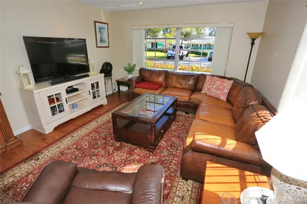 a living room with furniture and a couch