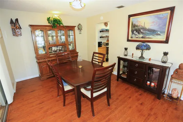 a view of a dining room with furniture
