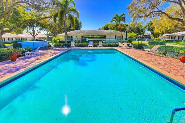 a view of a house with swimming pool