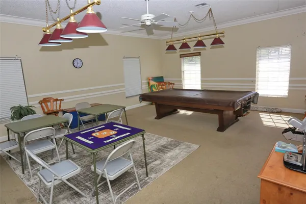 a room with gym equipment and a window