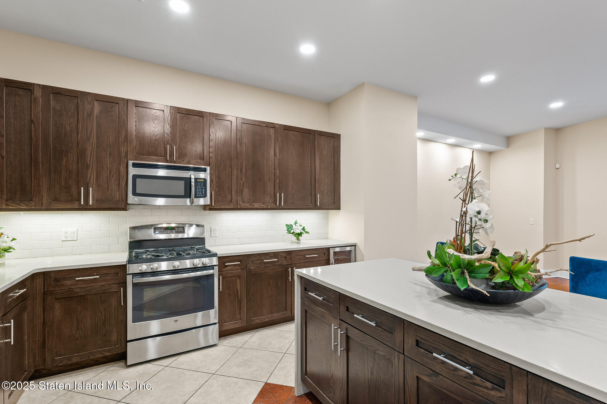 90 Bay Street Landing, Unit 1F Staten Island, NY 10301 - Photo 19 of 55 a kitchen with a sink and stove