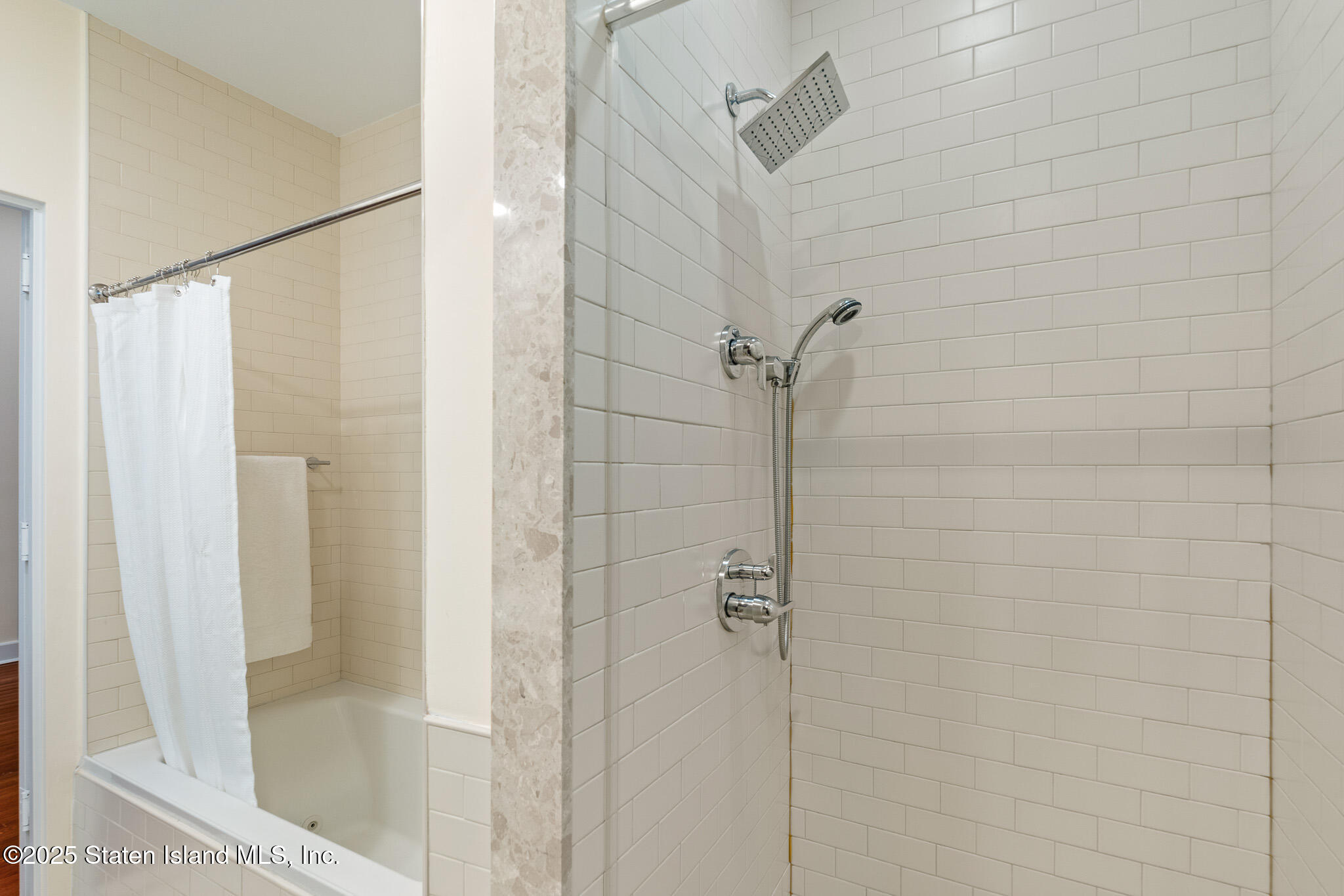 90 Bay Street Landing, Unit 1F Staten Island, NY 10301 - Photo 34 of 55 a bathroom with a shower