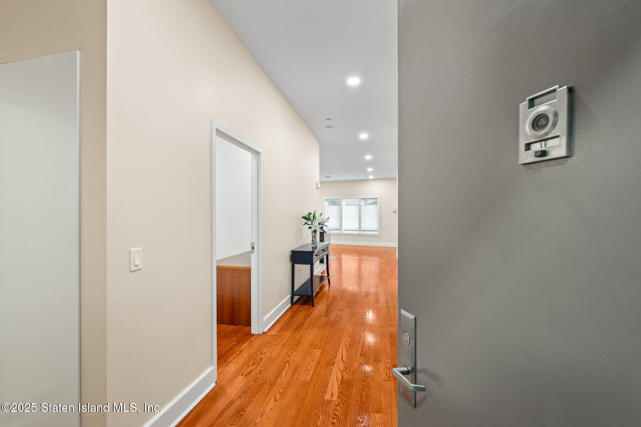 90 Bay Street Landing, Unit 1F Staten Island, NY 10301 - Photo 4 of 55 a view of a living room with hardwood floor