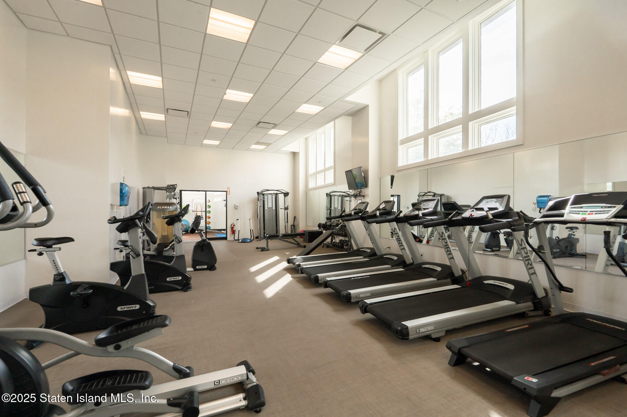 90 Bay Street Landing, Unit 1F Staten Island, NY 10301 - Photo 42 of 55 a view of a room with gym equipment