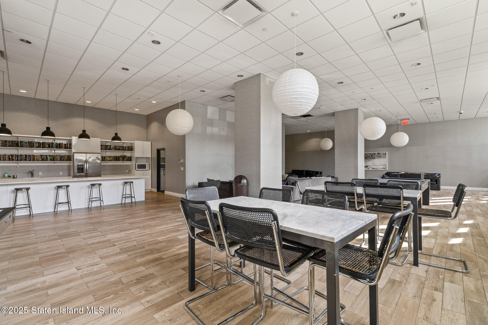 90 Bay Street Landing, Unit 1F Staten Island, NY 10301 - Photo 46 of 55 a view of a dining area with furniture and a rug