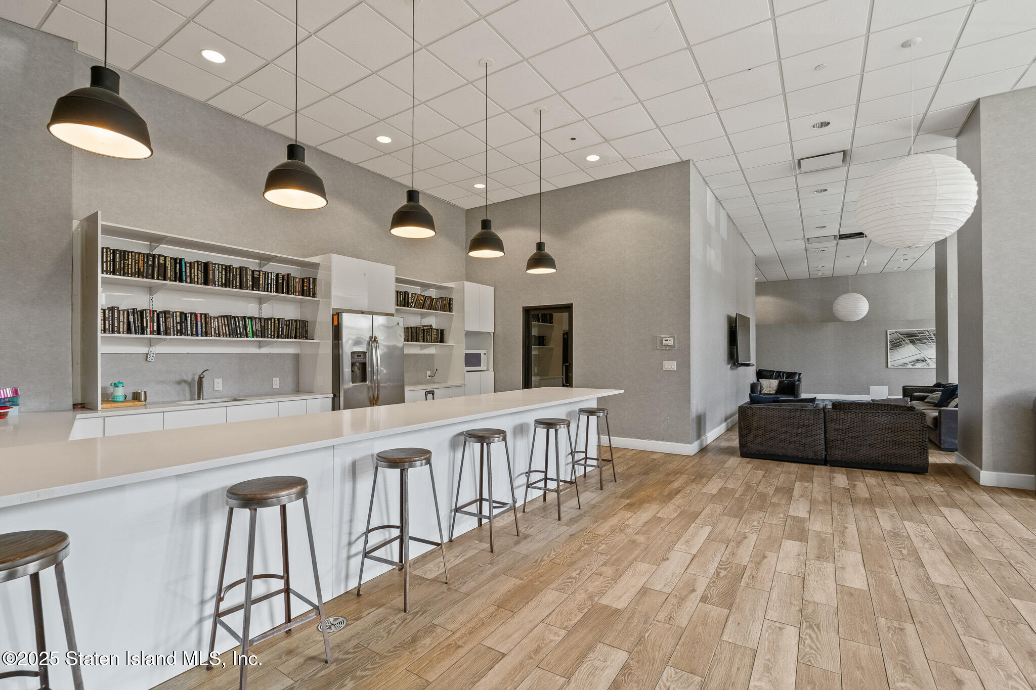 90 Bay Street Landing, Unit 1F Staten Island, NY 10301 - Photo 47 of 55 a living room with hard wood flooring and furniture