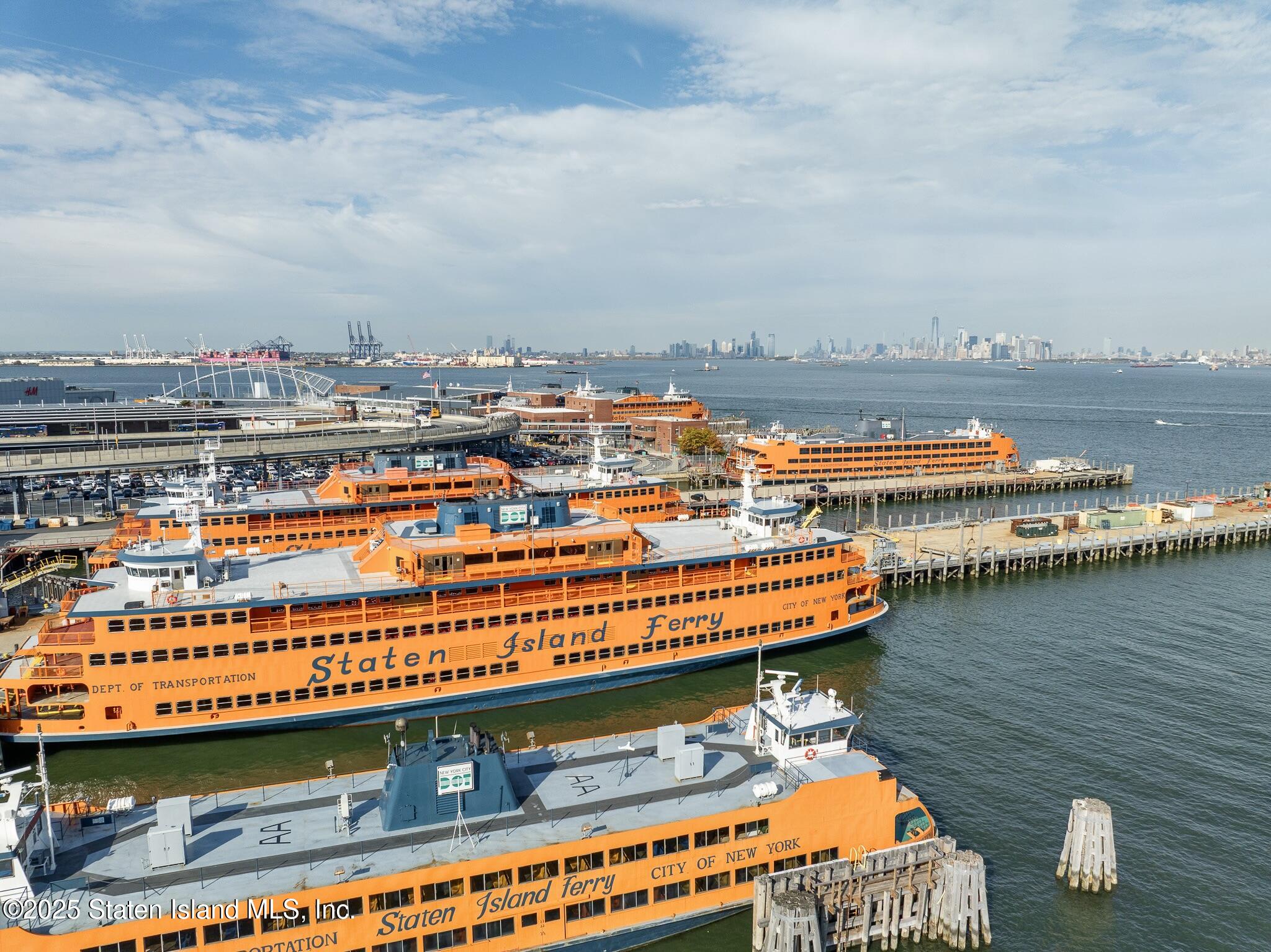 90 Bay Street Landing, Unit 1F Staten Island, NY 10301 - Photo 52 of 55 a view of a lake with houses