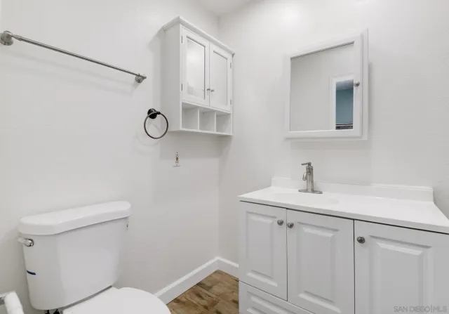 a bathroom with a sink and a toilet