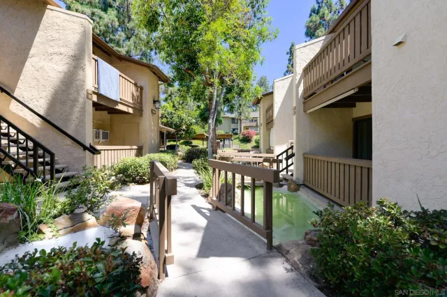 a view of balcony with outdoor seating and plants