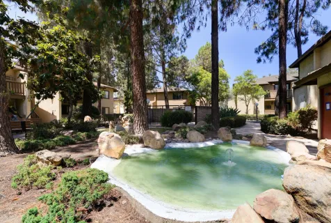a view of a backyard with sitting area