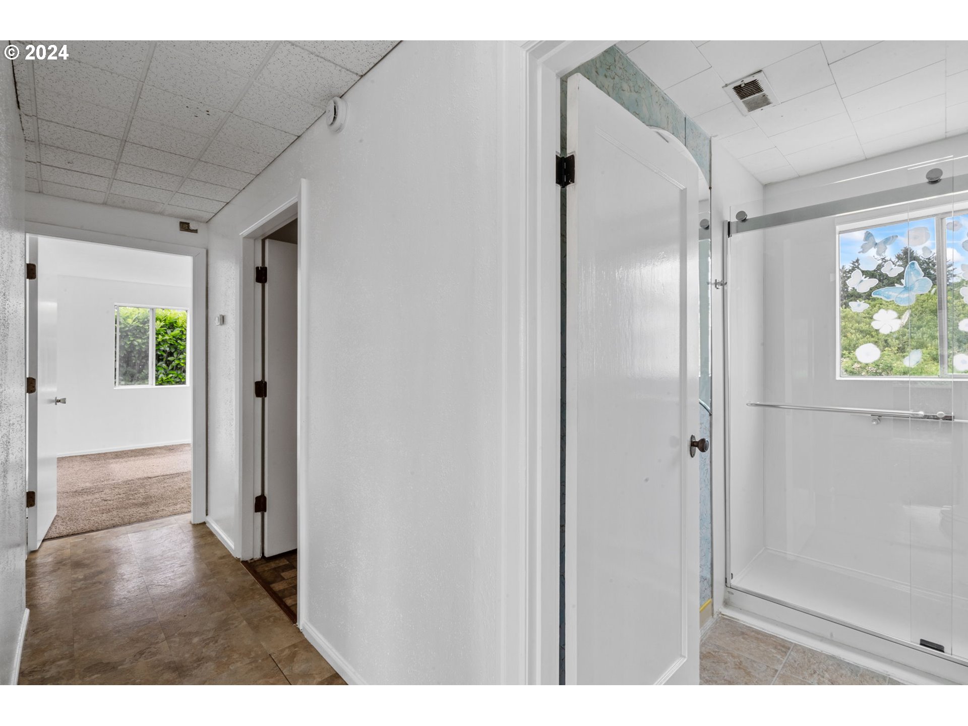 92165 Clover Road Astoria, OR 97103 - Photo 15 of 31 a bathroom with a shower and a glass door