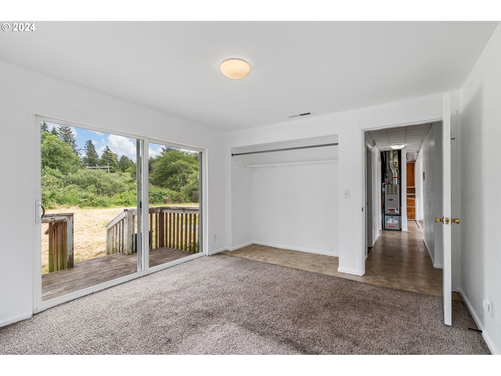 92165 Clover Road Astoria, OR 97103 - Photo 19 of 31 a view of an empty room with a window