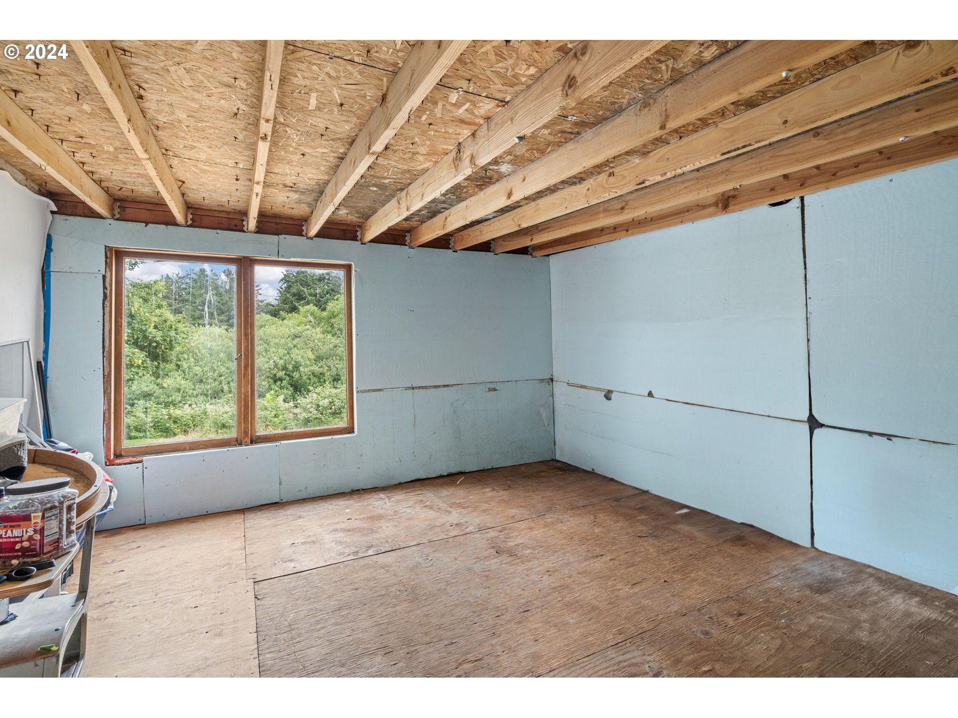92165 Clover Road Astoria, OR 97103 - Photo 23 of 31 a view of an empty room with a window