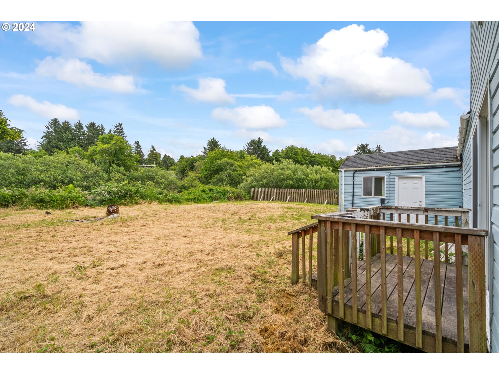 92165 Clover Road Astoria, OR 97103 - Photo 26 of 31 a view of a house with pool and a yard