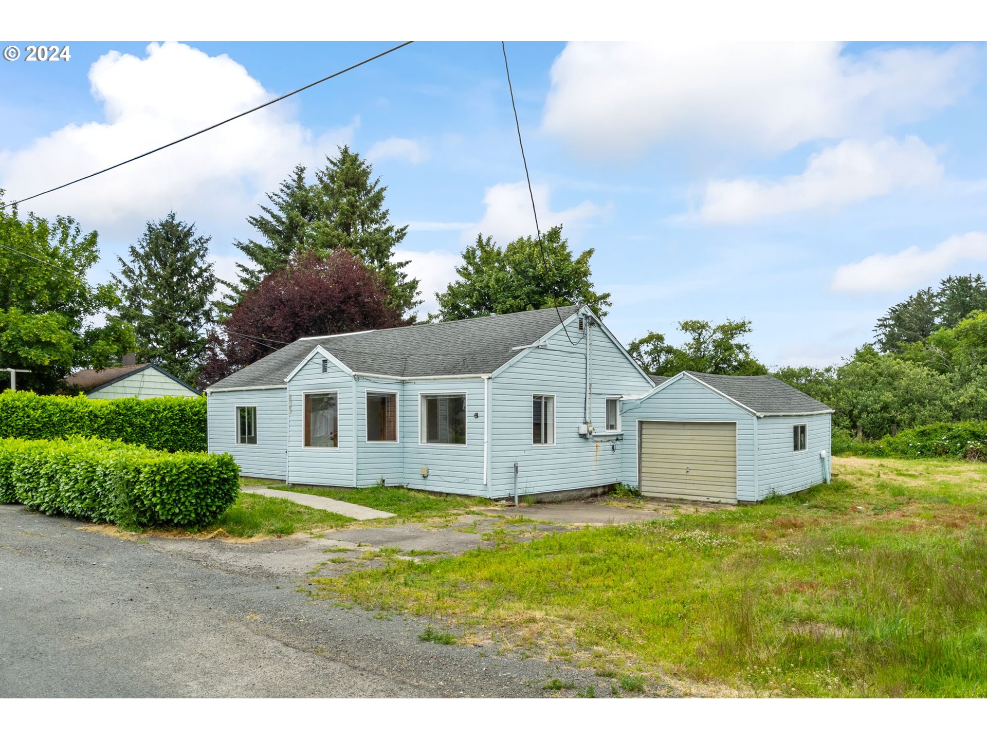 92165 Clover Road Astoria, OR 97103 - Photo 3 of 31 a view of a house with a yard