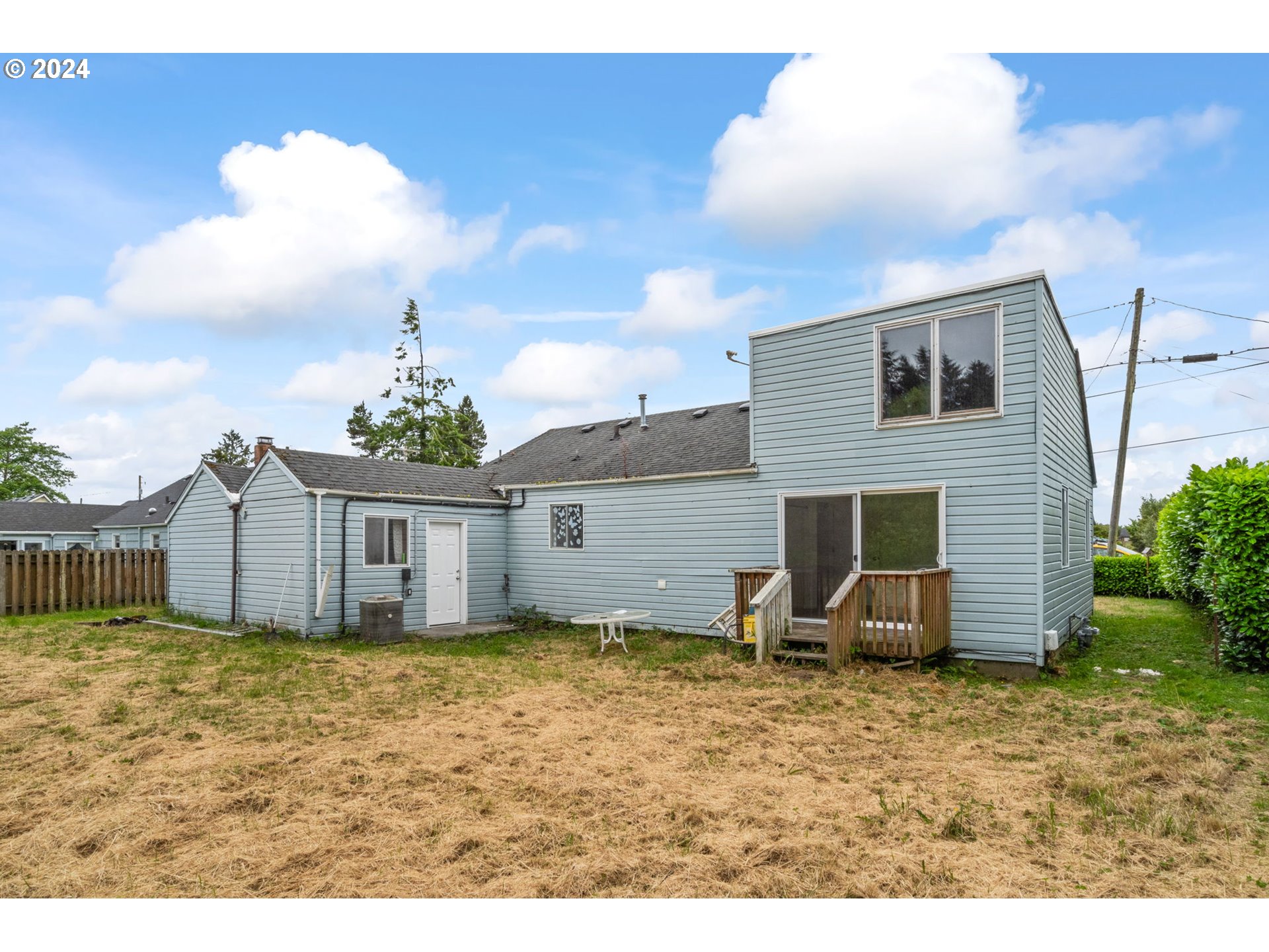 92165 Clover Road Astoria, OR 97103 - Photo 31 of 31 a view of a house with a yard