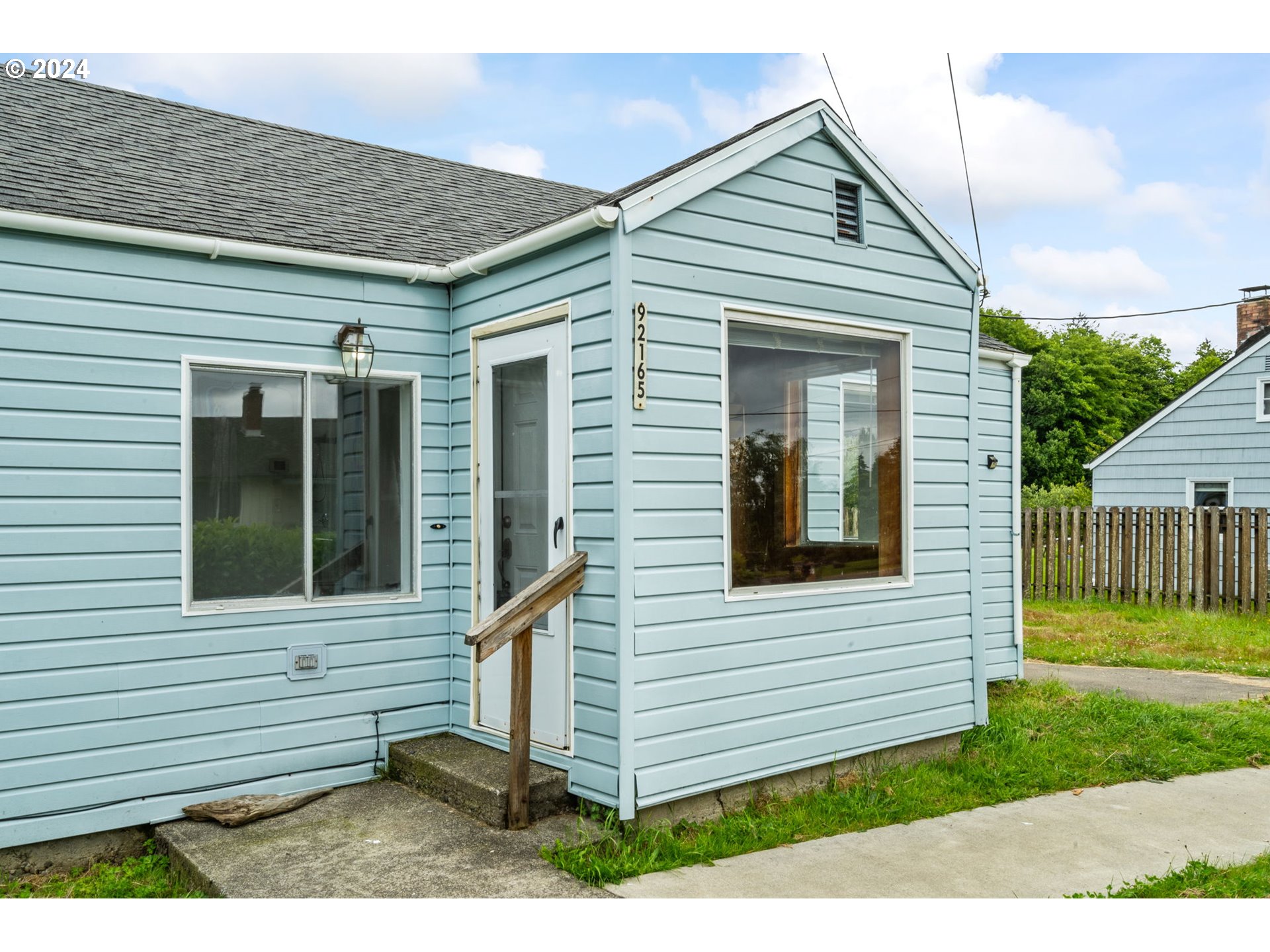 92165 Clover Road Astoria, OR 97103 - Photo 5 of 31 a view of a house with a yard