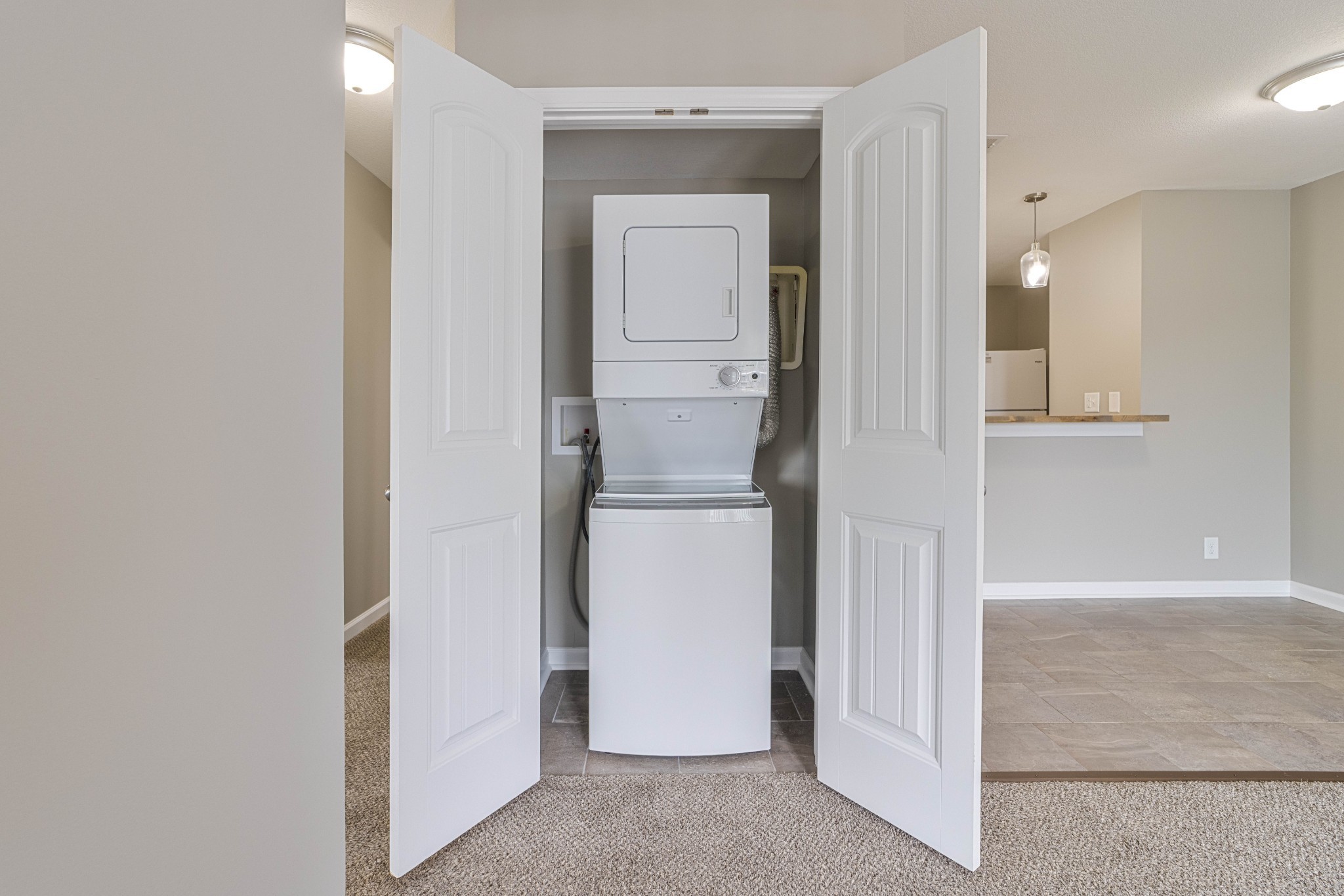 311 Hawkins Road, Unit O7 Clarksville, TN 37040 - Photo 11 of 17 a room with a refrigerator and mirror