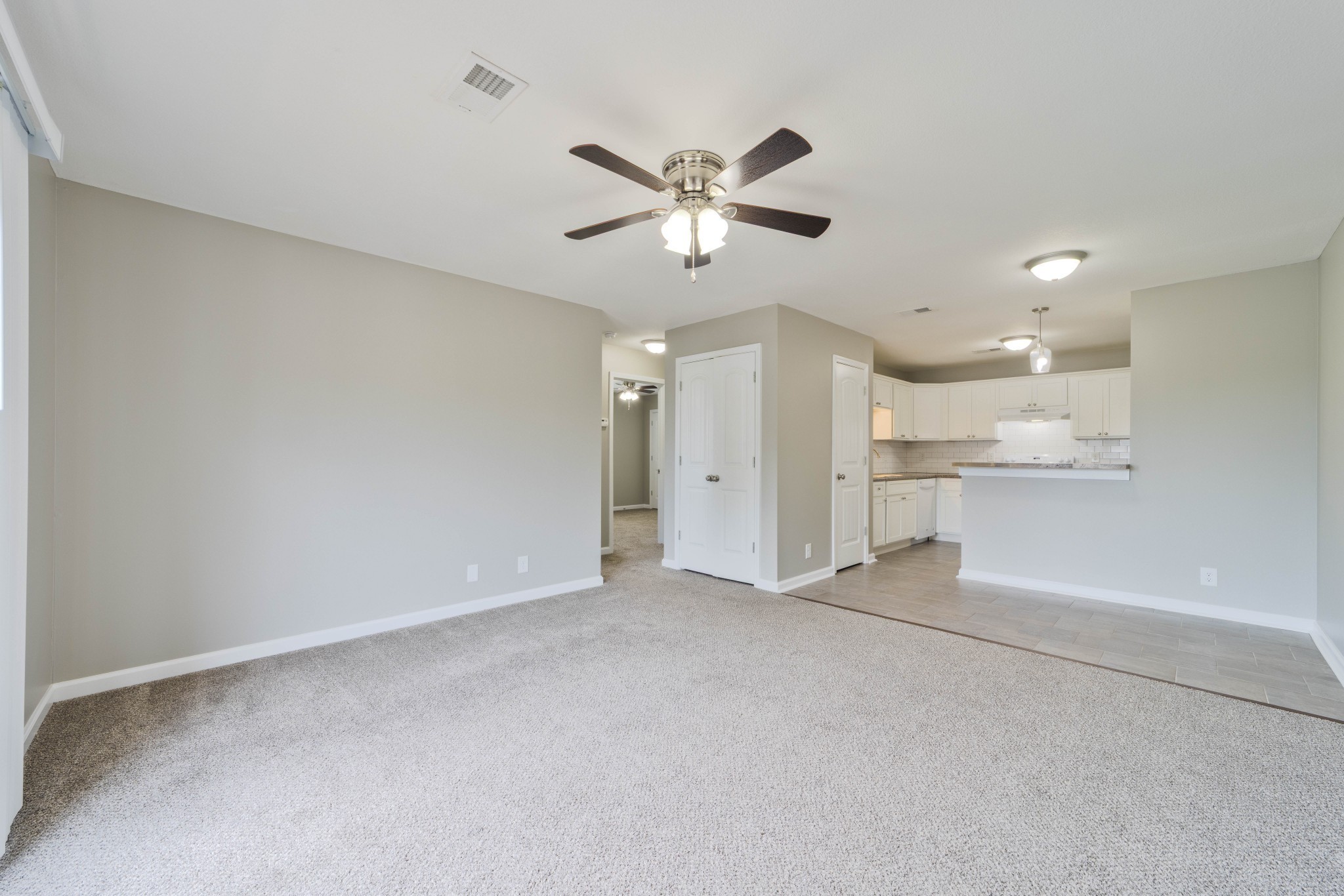 311 Hawkins Road, Unit O7 Clarksville, TN 37040 - Photo 4 of 17 a view of an empty room and kitchen view