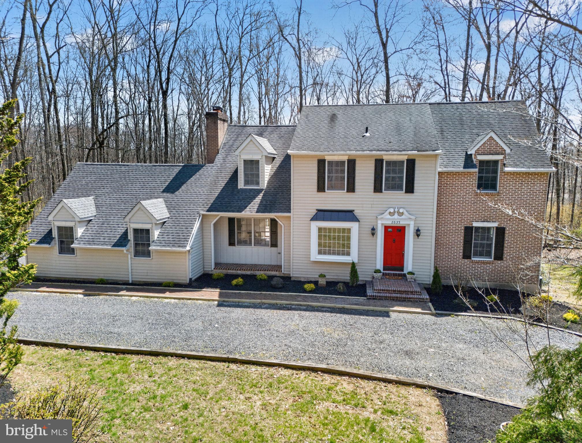 2635 Possum Hollow Road Quakertown, PA 18951 - Photo 1 of 78 a aerial view of a house with a yard