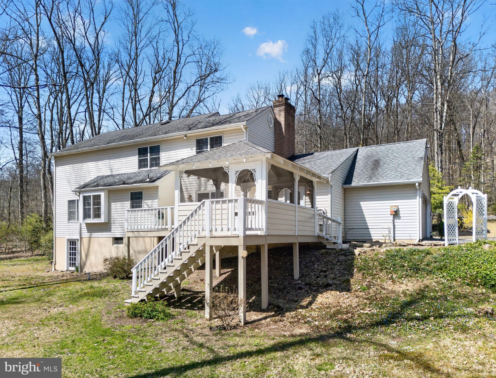 2635 Possum Hollow Road Quakertown, PA 18951 - Photo 11 of 78 front view of a house with a yard