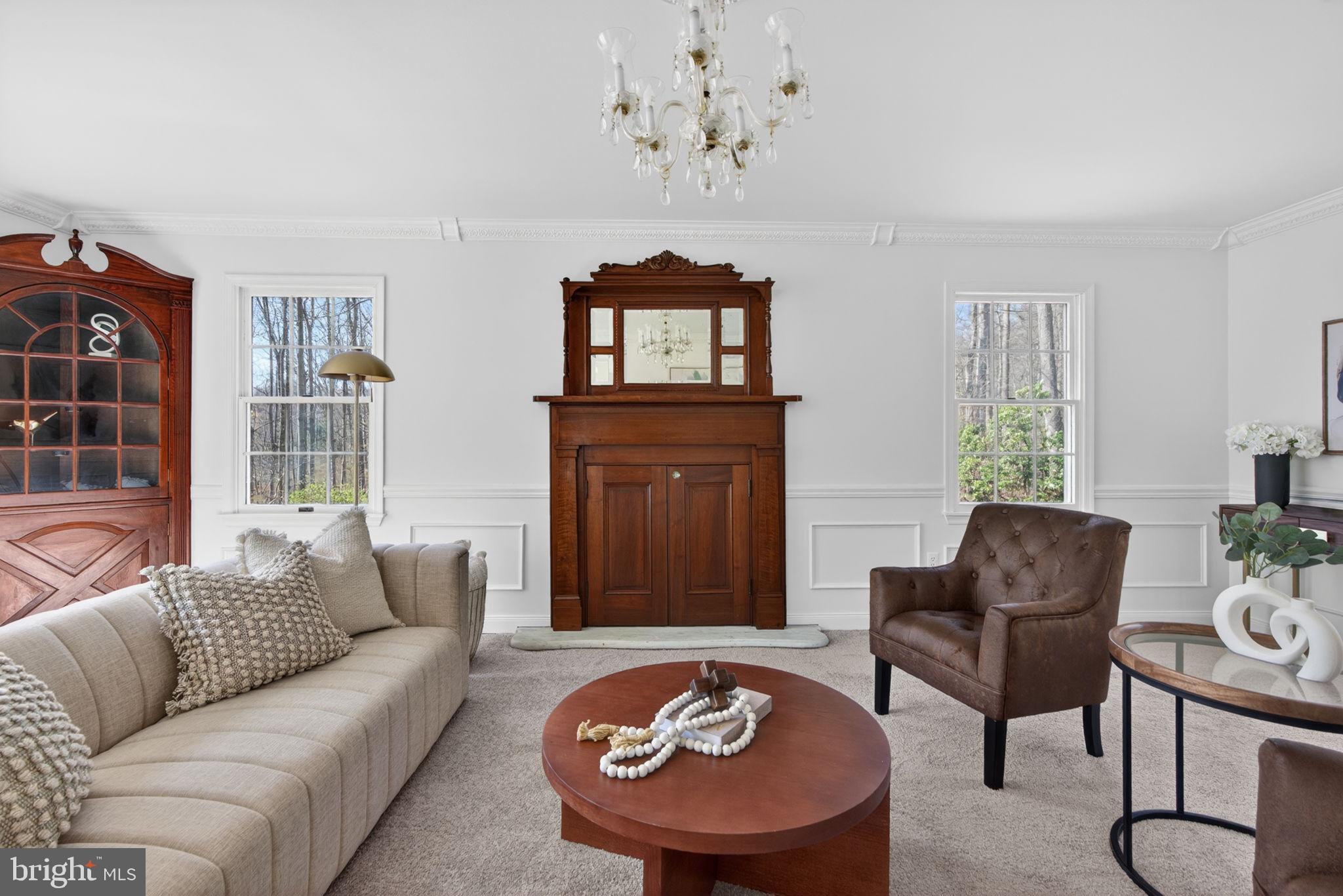 2635 Possum Hollow Road Quakertown, PA 18951 - Photo 28 of 78 a living room with furniture and a chandelier