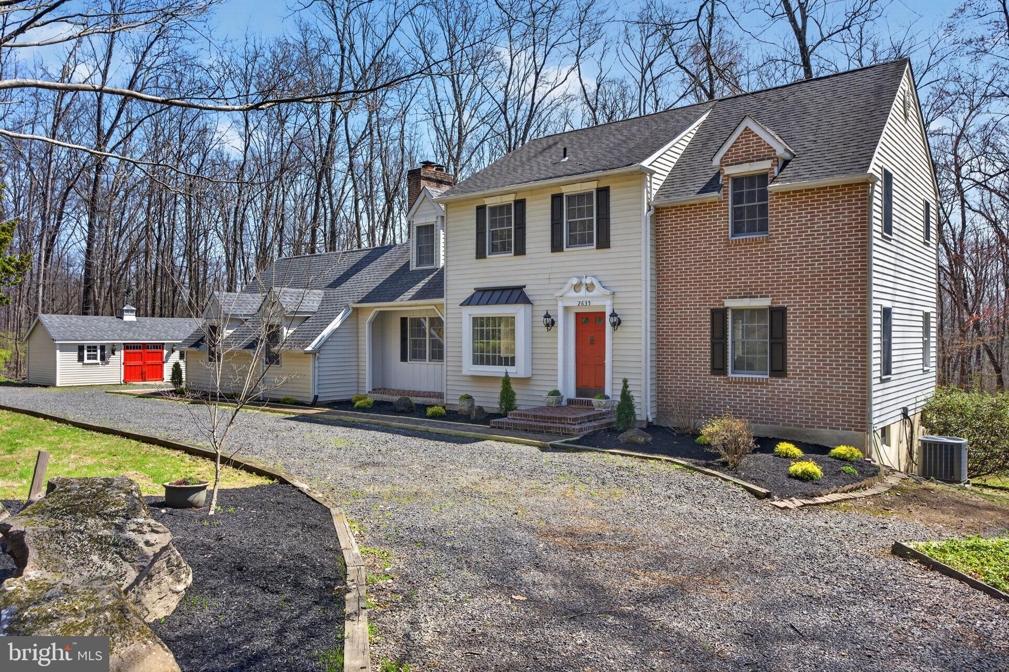 2635 Possum Hollow Road Quakertown, PA 18951 - Photo 3 of 78 a white house that has a tree in it
