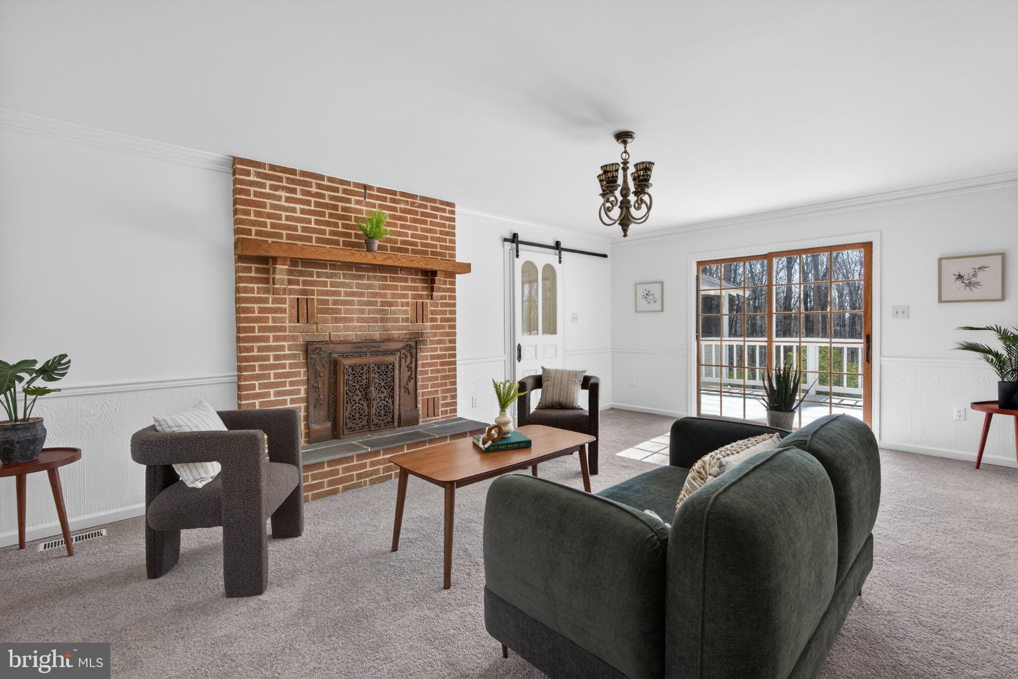 2635 Possum Hollow Road Quakertown, PA 18951 - Photo 34 of 78 a living room with furniture and a fireplace