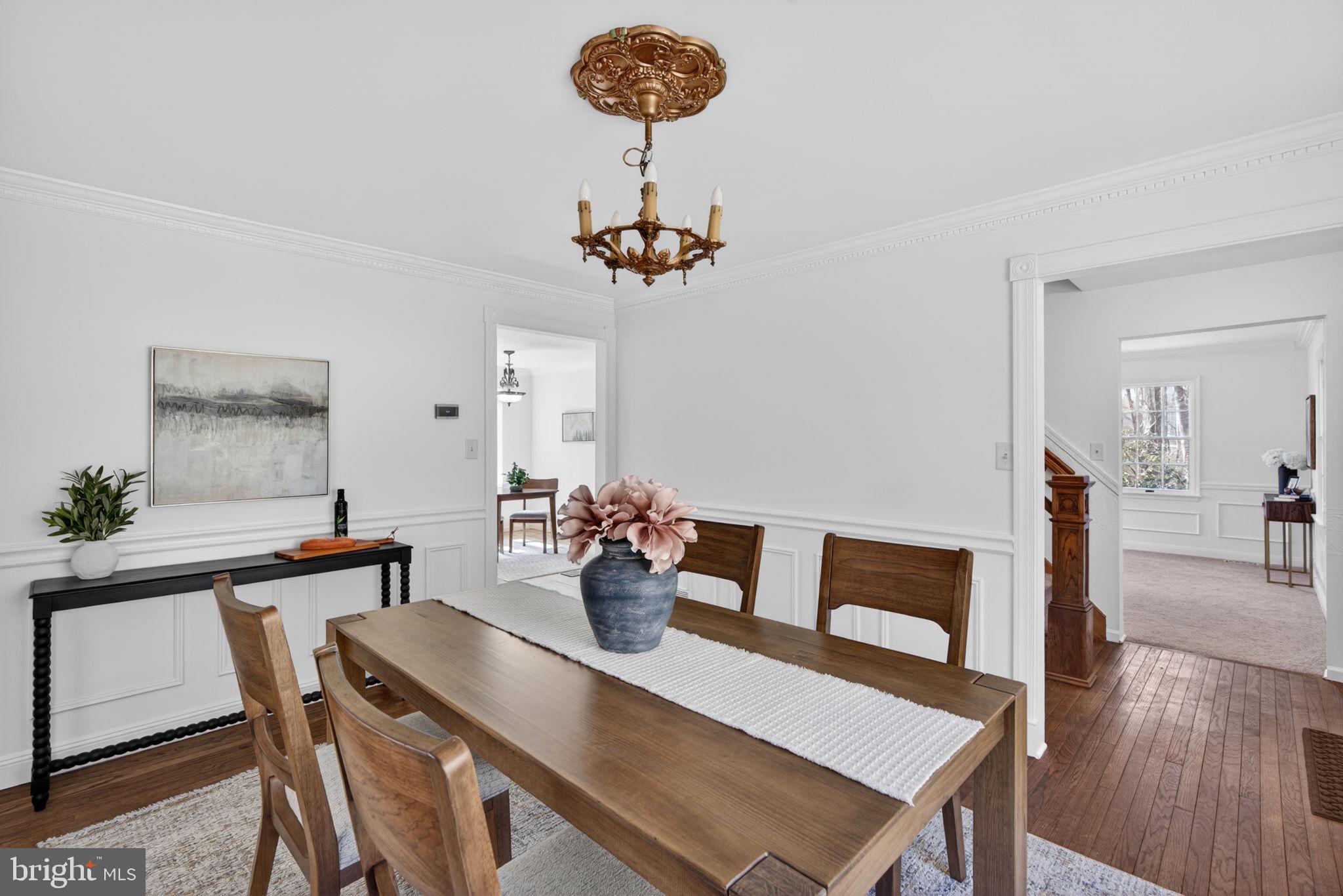 2635 Possum Hollow Road Quakertown, PA 18951 - Photo 55 of 78 a view of a dining room with furniture a chandelier and wooden floor