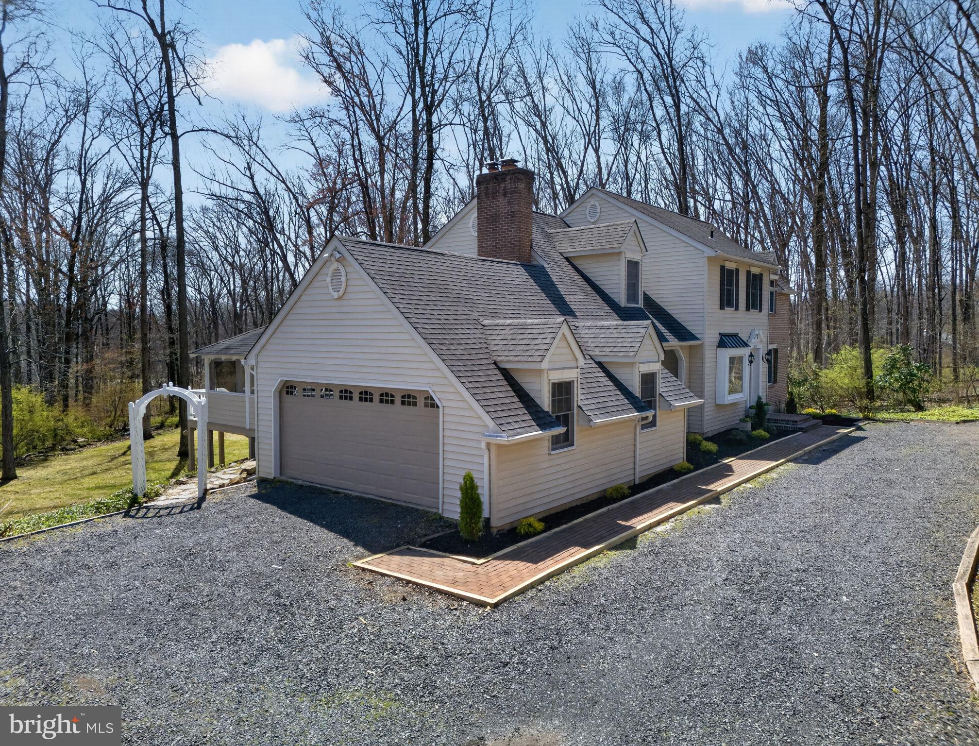 2635 Possum Hollow Road Quakertown, PA 18951 - Photo 6 of 78 a view of a house with a yard and large trees
