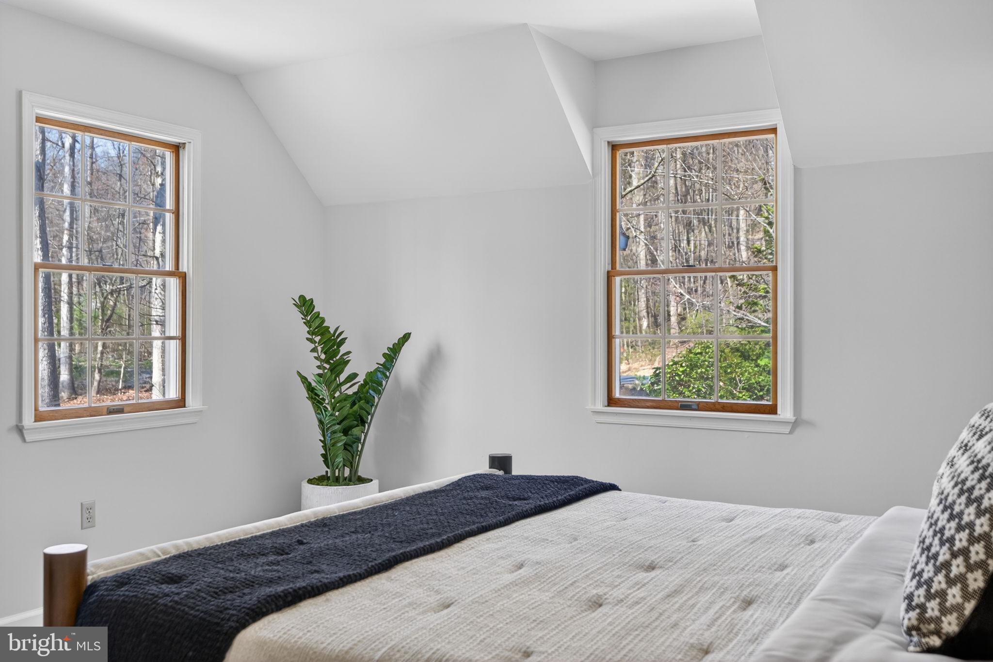 2635 Possum Hollow Road Quakertown, PA 18951 - Photo 63 of 78 a bedroom with a bed window and wooden floor