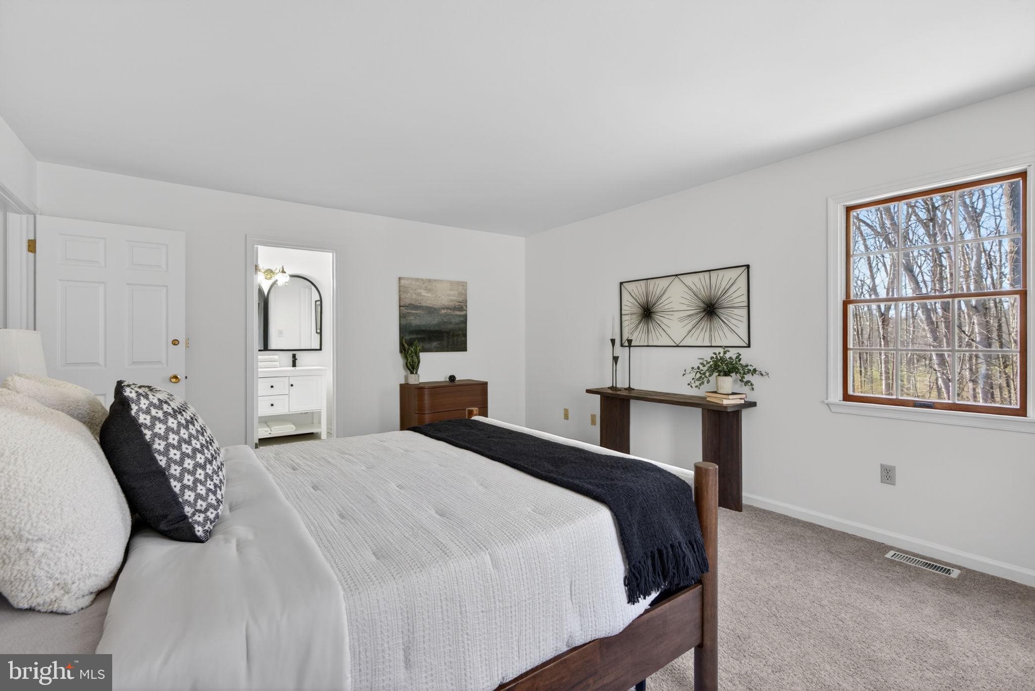 2635 Possum Hollow Road Quakertown, PA 18951 - Photo 64 of 78 a bedroom with a bed and a window