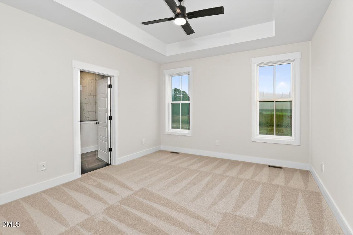 8 Trey Point Dr Spring Spring Hope, NC 27882 - Photo 10 of 31 a view of a room with a window and a ceiling fan