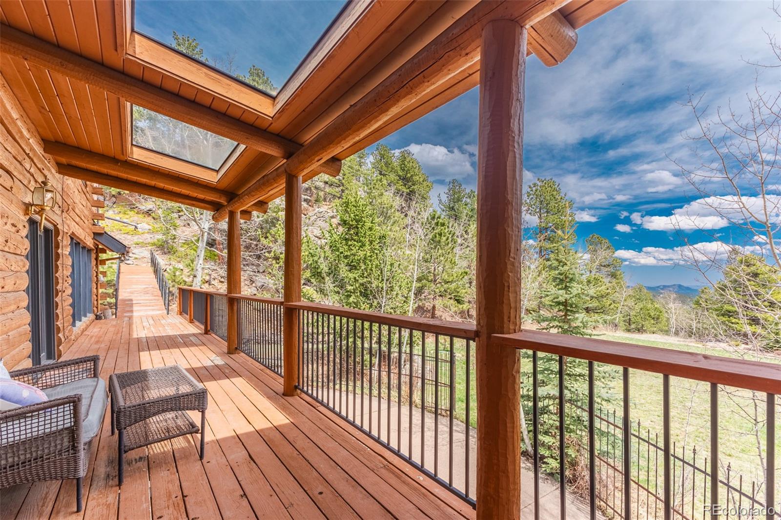24 Pine Valley Road Evergreen, CO 80439 - Photo 28 of 50 a view of porch with wooden floor