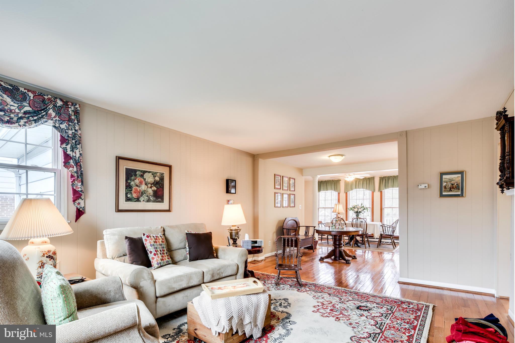 732 Warwick Road Baltimore, MD 21229 - Photo 3 of 30 a living room with furniture and wooden floor