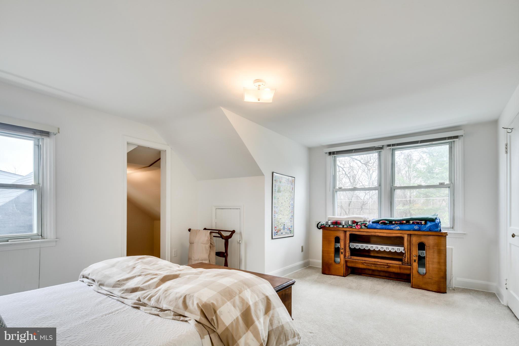 732 Warwick Road Baltimore, MD 21229 - Photo 22 of 30 a bedroom with a bed and a window