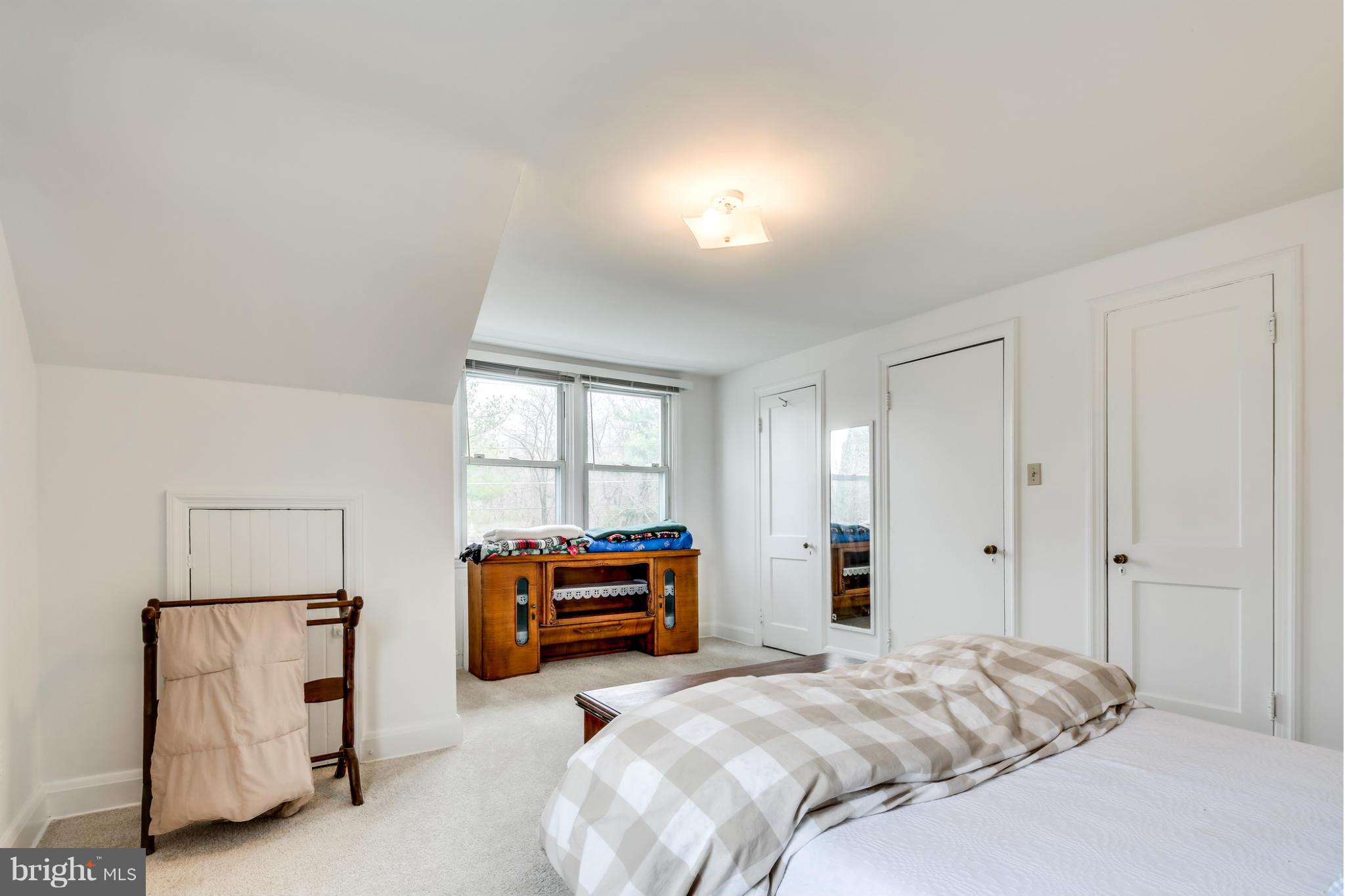 732 Warwick Road Baltimore, MD 21229 - Photo 23 of 30 a bedroom with furniture and a bed