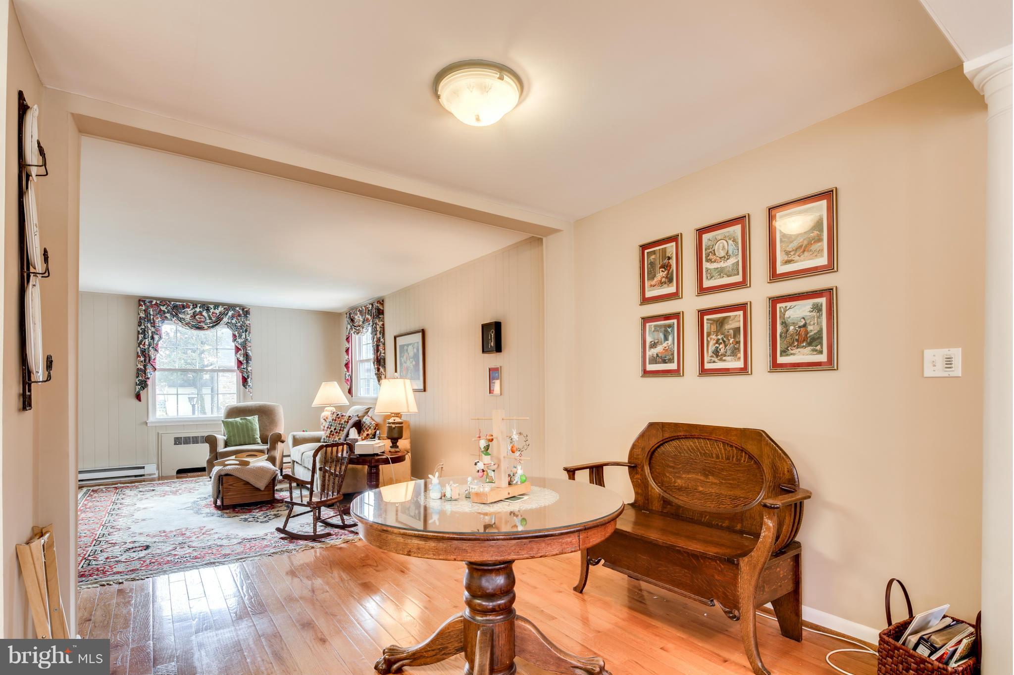 732 Warwick Road Baltimore, MD 21229 - Photo 6 of 30 a living room with furniture and wooden floor