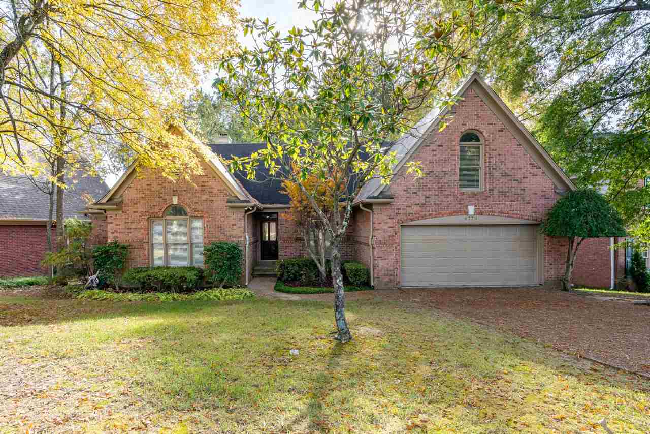 8779 Raspberry Lane Memphis, TN 38016 - Photo 1 of 25 a front view of a house with a yard