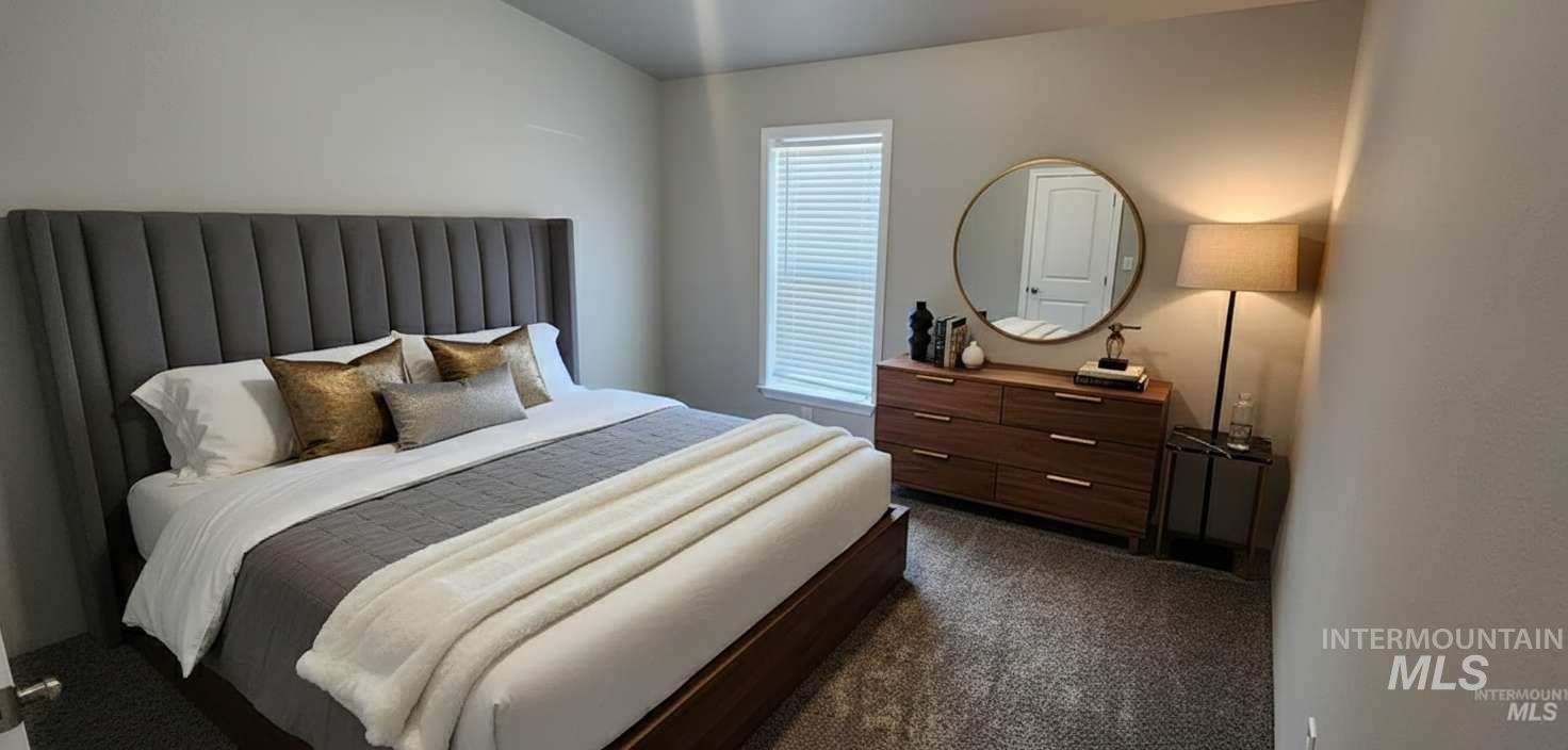 1817 South Exeter Road Council, ID 83612 - Photo 11 of 21 Bedroom featuring dark carpet