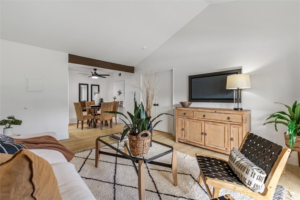 33852 Del Obispo Street, Unit 80 Dana Point, CA 92629 - Photo 13 of 36 a living room with furniture and a flat screen tv