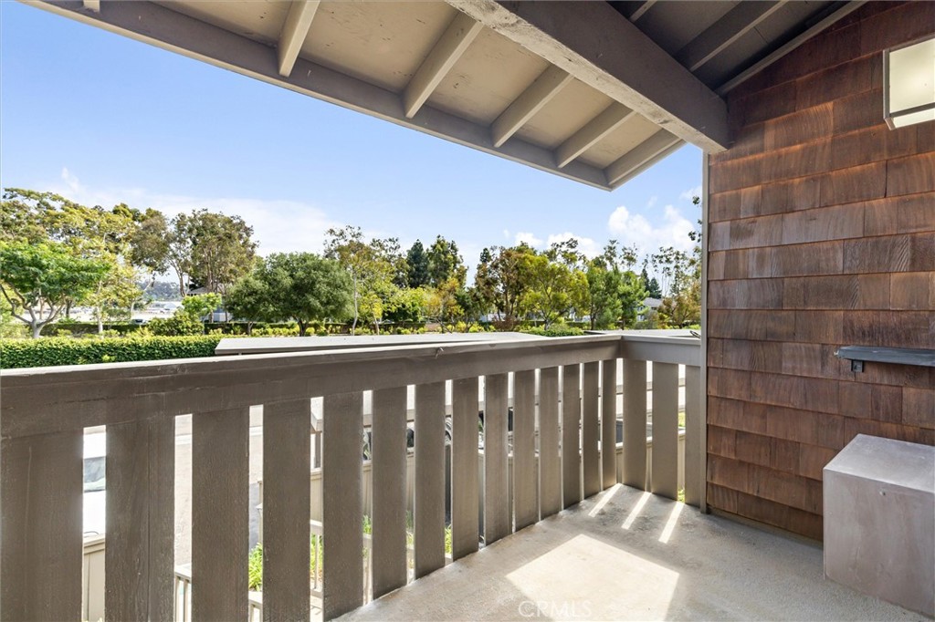 33852 Del Obispo Street, Unit 80 Dana Point, CA 92629 - Photo 16 of 36 a balcony with wooden floor and outdoor space