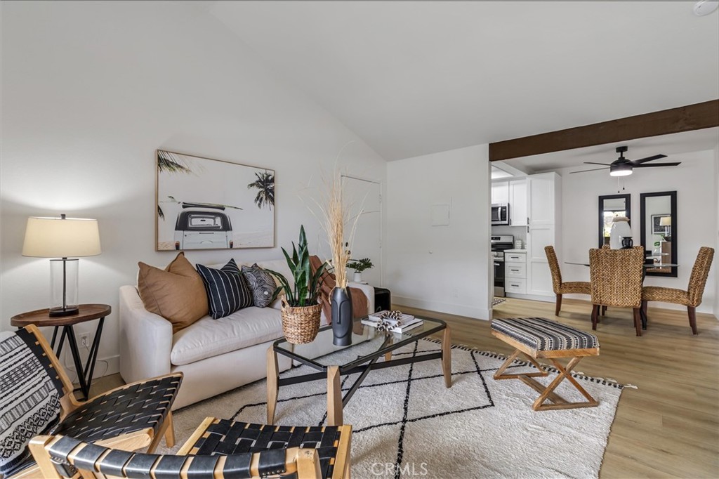 33852 Del Obispo Street, Unit 80 Dana Point, CA 92629 - Photo 18 of 36 a living room with furniture and wooden floor