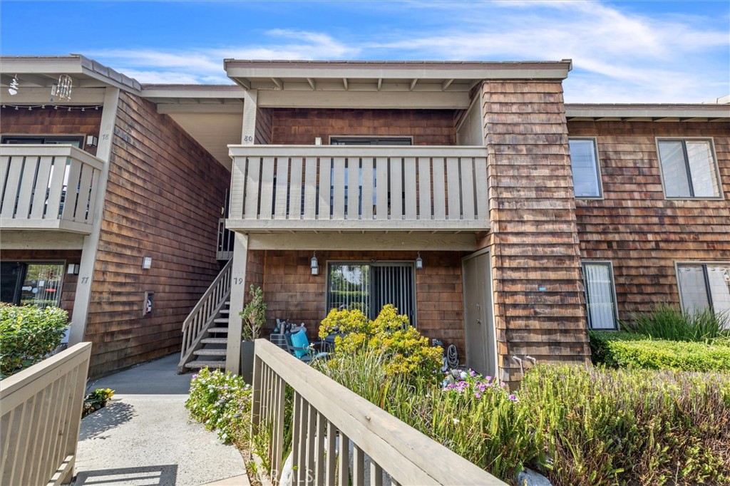 33852 Del Obispo Street, Unit 80 Dana Point, CA 92629 - Photo 28 of 36 a front view of a house with plants
