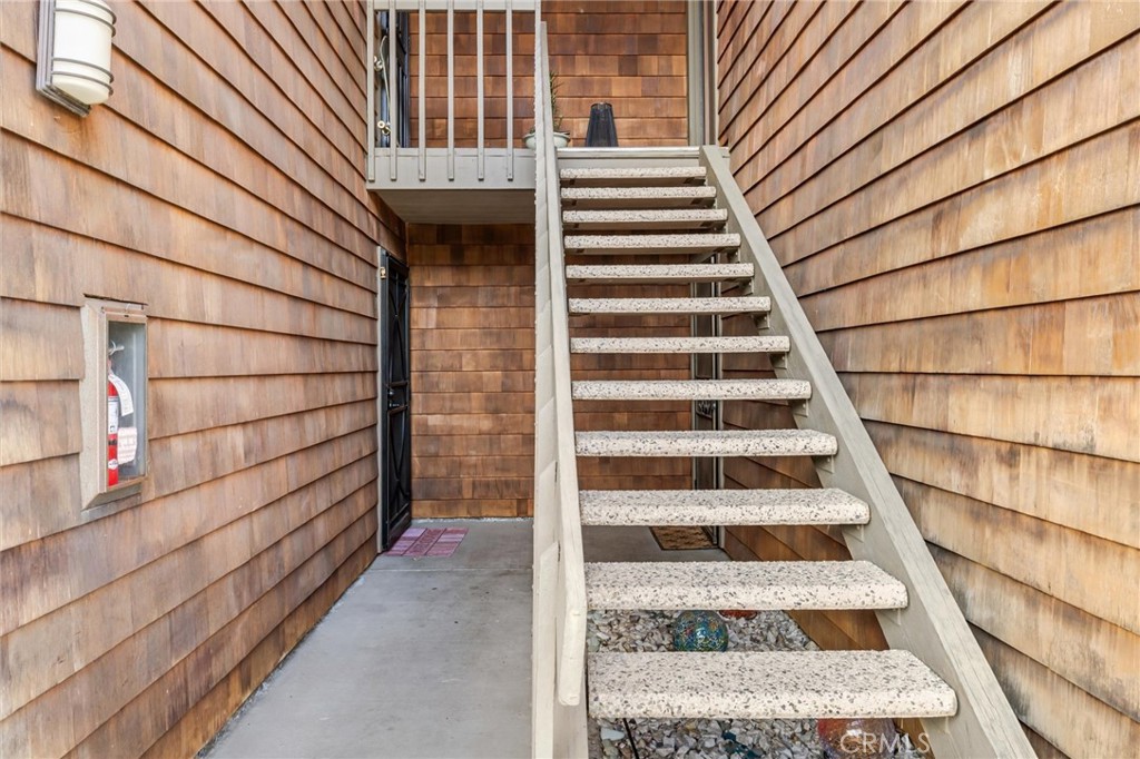 33852 Del Obispo Street, Unit 80 Dana Point, CA 92629 - Photo 29 of 36 a view of entryway with wooden door