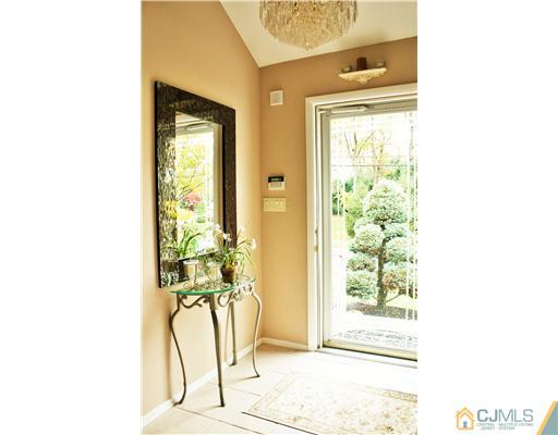 3 Timber Road Edison, NJ 08820 - Photo 3 of 24 a view of a room with a window and a mirror